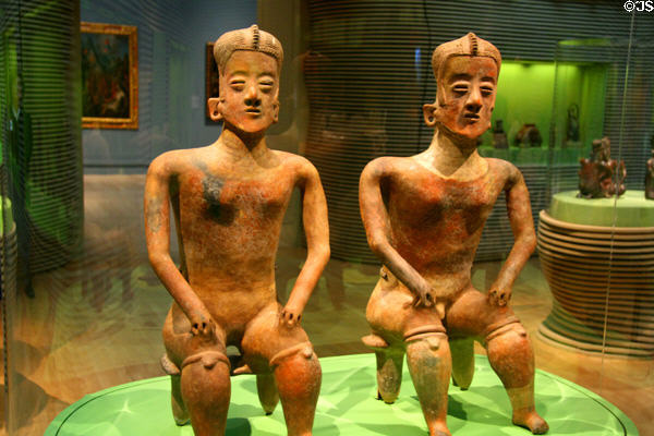 Colima pottery man & woman on bench (200 BCE-500 CE) at LACMA. Los Angeles, CA.