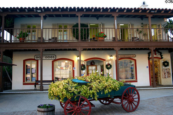 Monterey styled shop with wagon at Seaport Village. San Diego, CA.