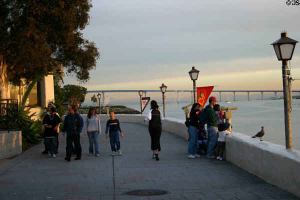 Walkway along Seaport Village plus Coronado Bridge. San Diego, CA.
