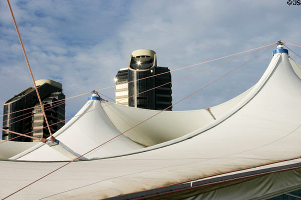 Convention Center I fabric roof & black towers of Harbor Club. San Diego, CA.