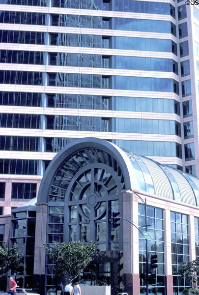 Glass entrance arcade of Koll Center (1989) (20 floors) (501 West Broadway). San Diego, CA. Architect: Langdon Wilson.