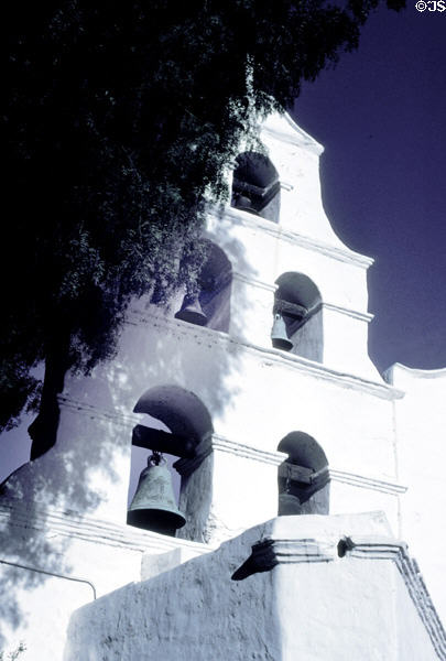San Diego Mission adobe wall with bells. San Diego, CA.