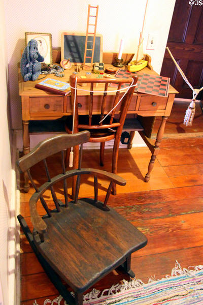 Childhood toys & rocking chair at Davis House Museum. San Diego, CA.