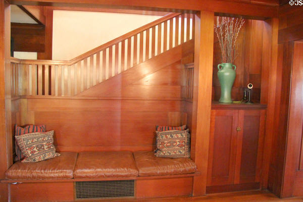 Arts & crafts stairway hall with built-in seating & telephone stand at Marston House Museum. San Diego, CA.