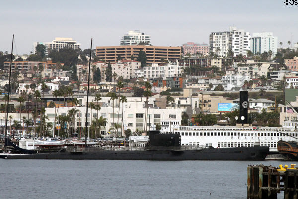 Russian submarine & Ferry Berkeley at Maritime Museum against skyline of San Diego. San Diego, CA.