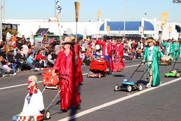 Marching lawnmower drill team at Balloon Parade. San Diego, CA.
