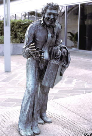 Shaking Man sculpture (1993) by Terry Allen in cartoon-like triplicate vibrations of person in earthquake zone at Yerba Buena Gardens. San Francisco, CA.