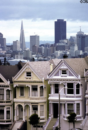 Tall Transamerica Pyramid & Bank of America Center over Victorian houses on Alamo Square. San Francisco, CA.