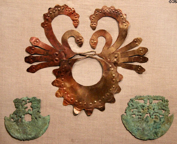 Gold Nazca mouth mask (300-700) & Chimú copper ceremonial knife blades (3rdC BCE- 3rd C CE) from Peru at de Young Museum. San Francisco, CA.