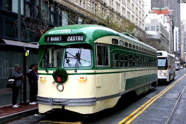 Modern streetcar in Mission district with new Muni markings. San Francisco, CA.