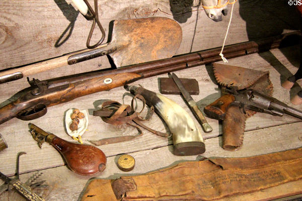 Display of typical miners' tools including firearms & powder horns in Columbia Museum at Columbia State Historic Park. Columbia, CA.