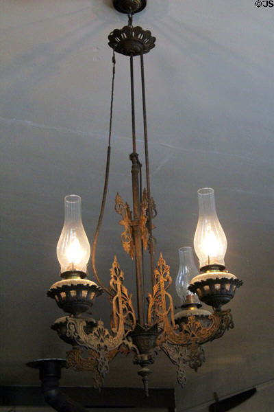 Antique ceiling kerosene lamp in Bixel Brewery at Columbia State Historic Park. Columbia, CA.