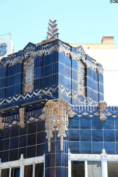 Art Deco blue terra cotta detail of tower of Oakland Floral Depot Building (1900 Telegraph Ave.). Oakland, CA.