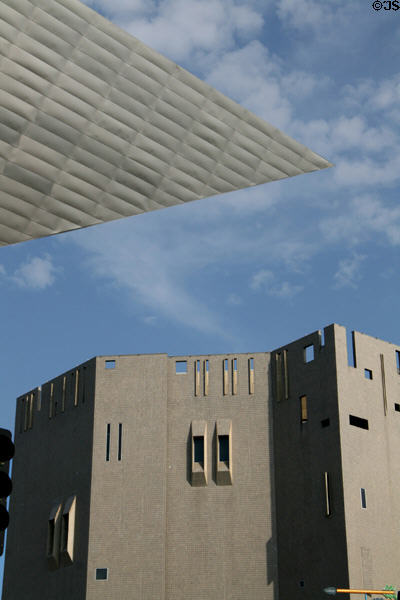 Contrasting textures & shapes of Hamilton & North wings of Denver Art Museum. Denver, CO.