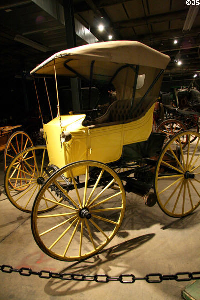 Auto buggy either drawn by horses or run by electric motor by Staver Carriage Factory, Chicago at Forney Museum. Denver, CO.