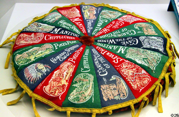 Cushion made of Pikes Peak, Colorado Springs & surrounding sites pennants at Colorado Springs Pioneers Museum. Colorado Springs, CO.