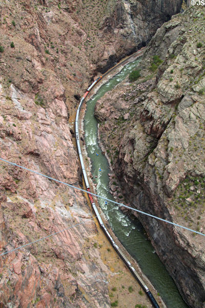 Royal Gorge Route Scenic Railway beside Arkansas River at bottom of Royal Gorge. CO.