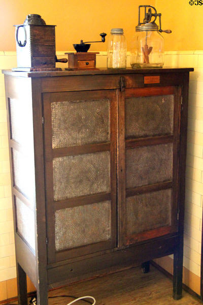 Pie safe with kitchen devices at Rosemount House Museum. Pueblo, CO.
