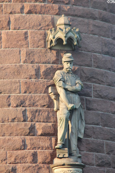 Statue of mason with army cap on tower of Hartford Soldiers and Sailors Civil War Memorial Arch. Hartford, CT.