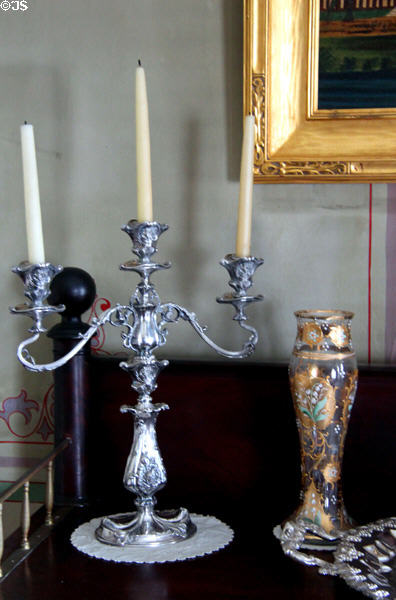 Silver candle stick on dining room sideboard at Isham-Terry House Museum. Hartford, CT.