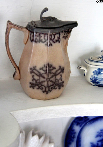 Pitcher with lid with brown design at Oliver Ellsworth Homestead Museum. Windsor, CT.