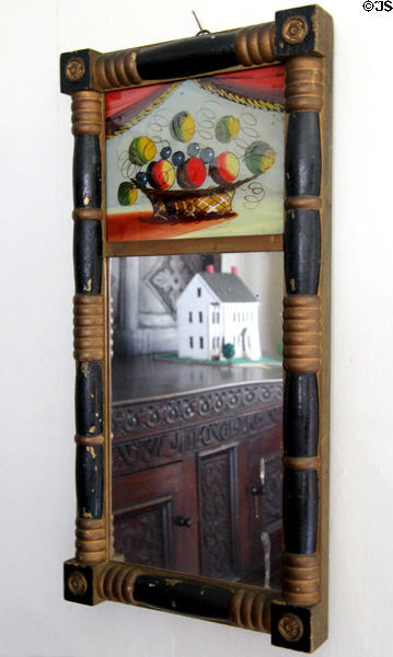 Mirror with painted panel of fruit at Oliver Ellsworth Homestead Museum. Windsor, CT.