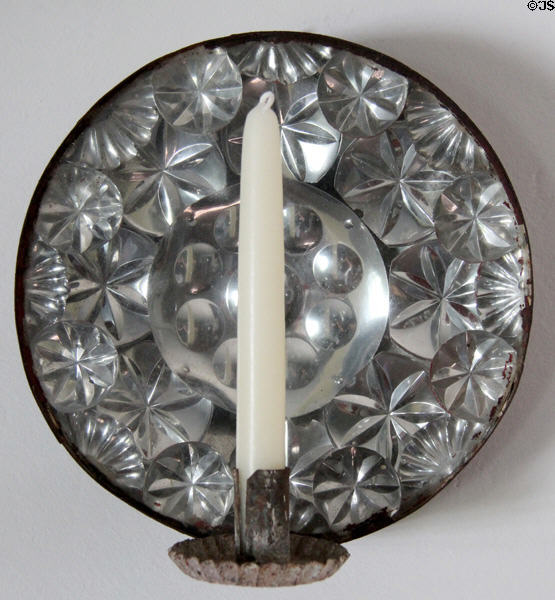 Candle sconce with tin reflector (18thC) at Phelps-Hathaway House. Suffield, CT.