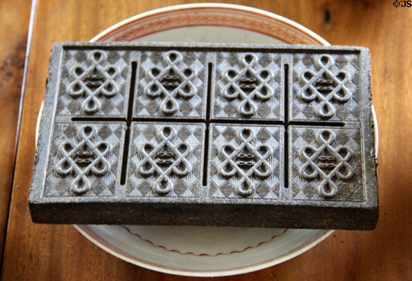 Brick of tea compressed to facilitate shipping in early 18th C at Phelps-Hathaway House. Suffield, CT.