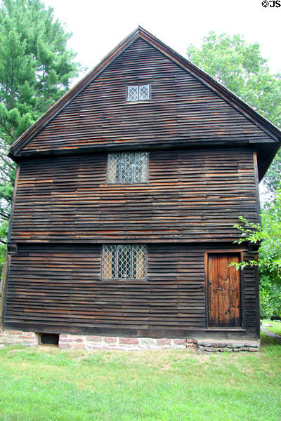Gable end of Buttolph-Williams House with leaded windows & weathered boards. Wethersfield, CT.
