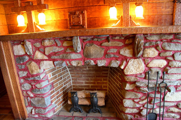 Fireplace with mantle lamps at Gillette Castle State Park. East Haddam, CT.