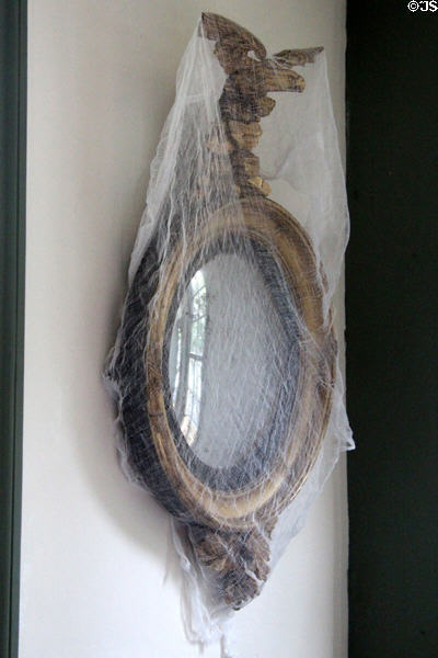 Gilded mirror covered with gauze in traditional manner because flies love taste of gilding at Thankful Arnold House. Haddam, CT.