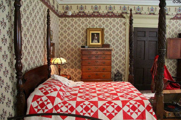Bed in Art Colony bedroom where guests lived a Bohemian life at Florence Griswold Museum. Old Lyme, CT.