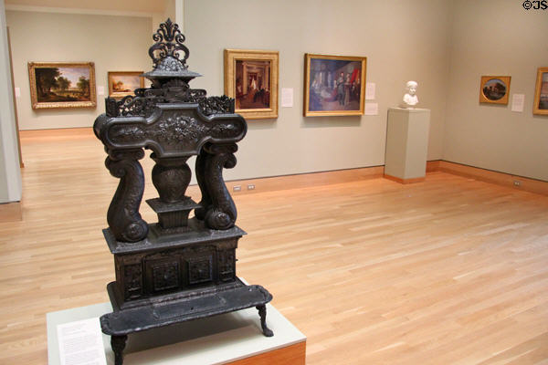 Cast iron four-column stove (c1844) by Ezra Ripley of Johnson, Geer & Cox Co. of Troy, NY at Florence Griswold Museum. Old Lyme, CT.