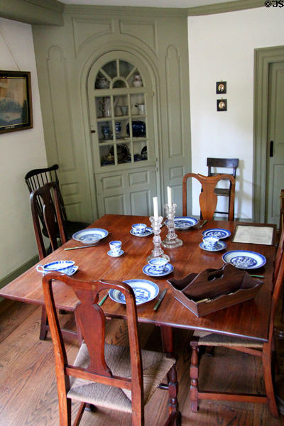 Dining room with corner cabinet & drop-leaf table at Judson House. Stratford, CT.