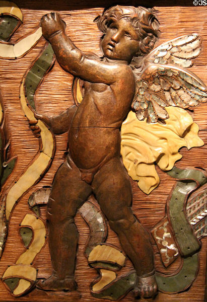 Detail of Putti on panel from dining room of Cornelius Vanderbilt II mansion (1880-2) by Augustus Saint-Gaudens at Smithsonian American Art Museum. Washington, DC.