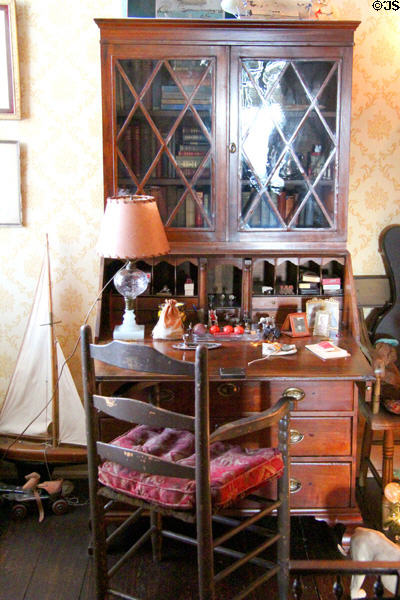 Drop-front desk & bookshelf with ladderback armchair at Tudor Place. Washington, DC.