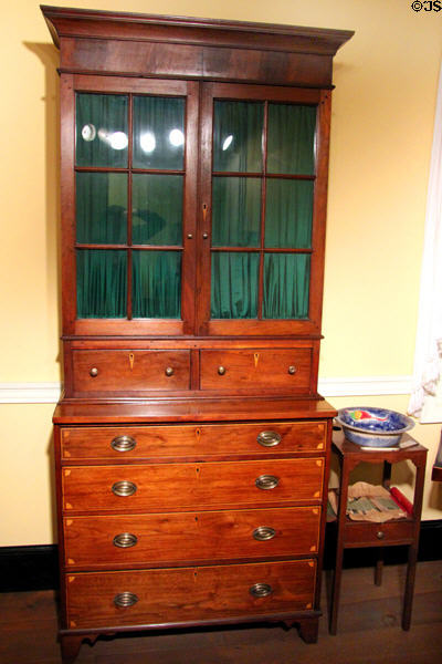 Desk & bookcase probably from Charleston (1810-20) in South Carolina period bedchamber at DAR Memorial Continental Hall. Washington, DC.