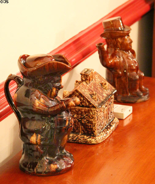 Rockingham items (late 19thC) made by Lyman, Fenton & Co. of Bennington, VT including Toby jug & teapot + house in Vermont period parlor at DAR Memorial Continental Hall. Washington, DC.