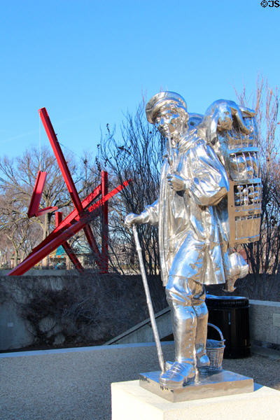 Kiepenkerl stainless steel sculpture (1987) of merchant with pack on back by Jeff Koons at Hirshhorn Museum Sculpture Garden. Washington, DC.