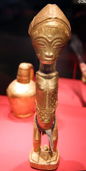 Wood female figure (late 19th or early 20thC) by Baule peoples of Côte d'Ivoire at National Museum of African Art. Washington, DC.