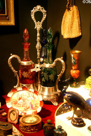Colored cut glass wine decanter set at Lightner Museum. St Augustine, FL.
