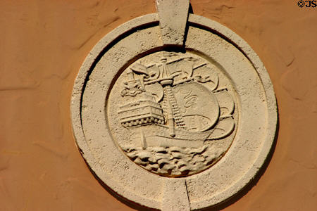 Medallion with sailing ship on 501 Collins Av. Miami Beach, FL.
