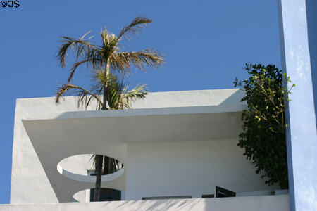 Miami-style building with porthole for palm tree. Miami Beach, FL.