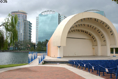 Band shell & highrises on Lake Eola. Orlando, FL.