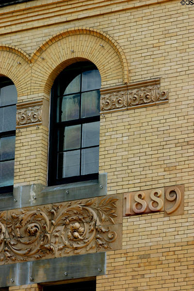 Arched window & terra-cotta detail of Chatham County Courthouse. Savannah, GA.