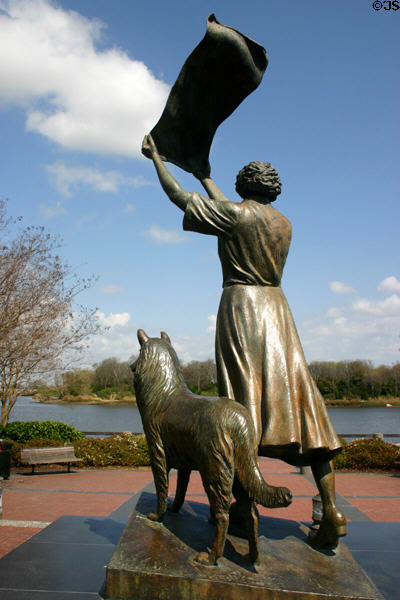 Statue of Savannah's Waving Girl who greeted ships passing in & out of harbor. Savannah, GA.