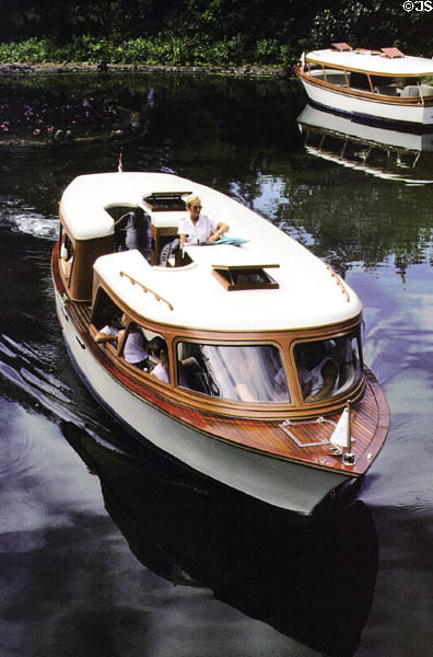 Antique wooden launch at Hilton Waikoloa Village, Kona coast. Big Island of Hawaii, HI.