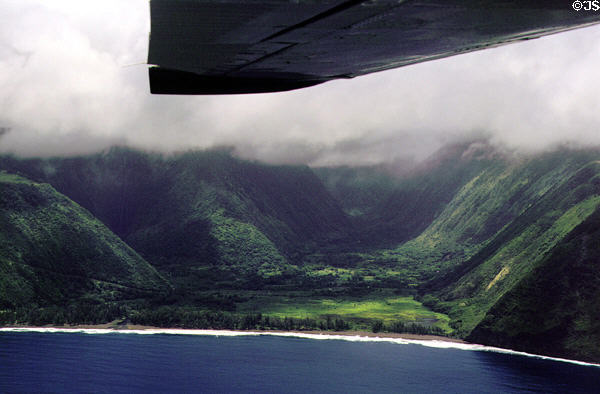 Waipio Valley on northern Hawaiian Island coast seen from air. Big Island of Hawaii, HI.