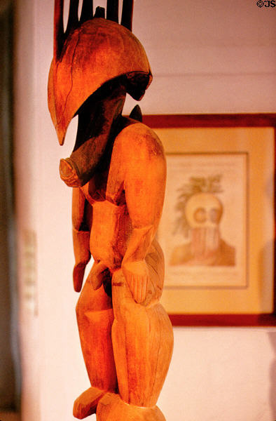 Statue of part man, part pig demi-god Kama Pua'a, the only native wooden statue found on Maui, at Bailey House Museum, Wailuku. Maui, HI.
