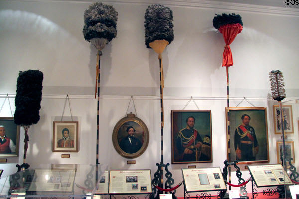 Kāhili royal feather standard & portraits of Hawaiian kings at Bishop Museum. Honolulu, HI.